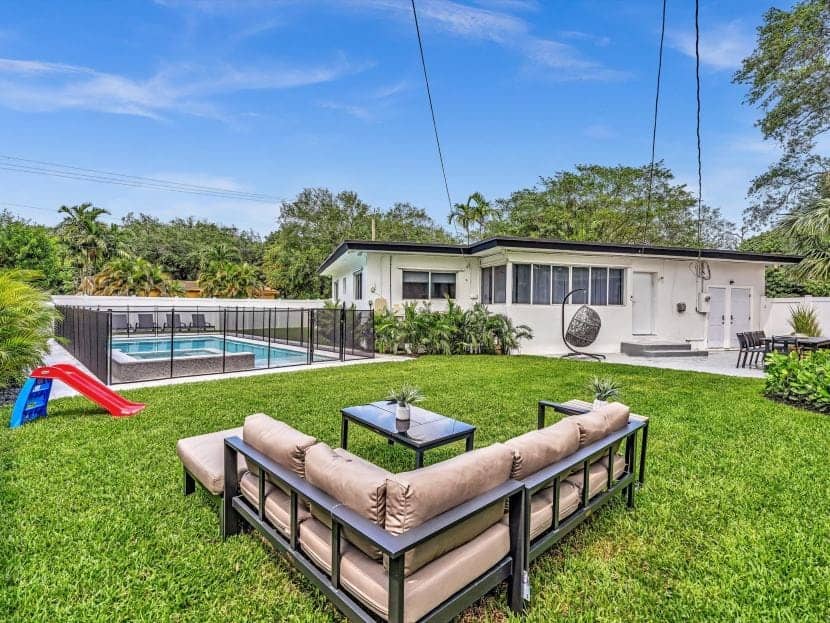 Spacious outdoors of a kosher villa in Miami with private pool and patio area
